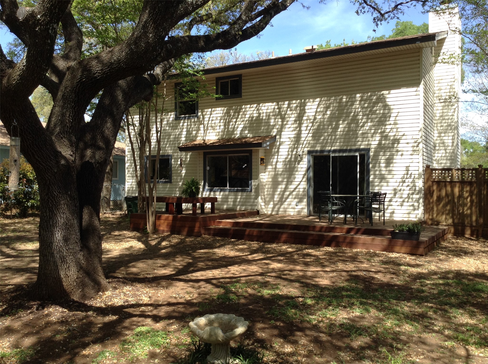 12007 Scribe Drive Austin, TX 78759 - Photo 21 of 35 a front view of a house with a tree