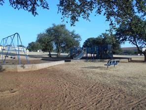 12007 Scribe Drive Austin, TX 78759 - Photo 28 of 35 a view of swimming pool with outdoor seating and trees