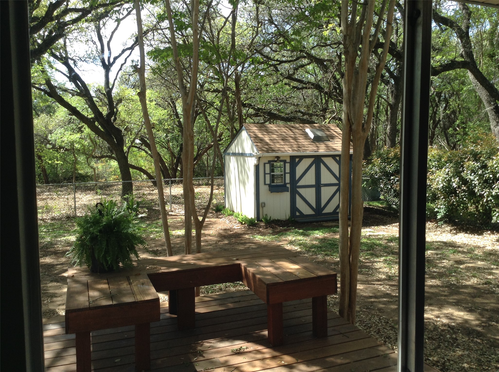 12007 Scribe Drive Austin, TX 78759 - Photo 7 of 35 a view of house with backyard from a tree