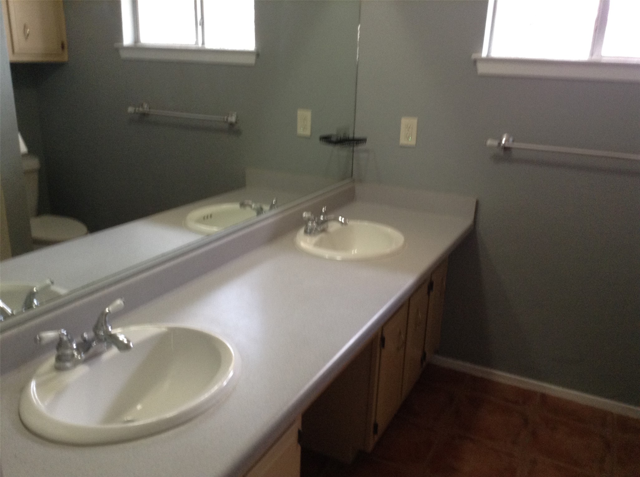 12007 Scribe Drive Austin, TX 78759 - Photo 9 of 35 a bathroom with a sink and a mirror