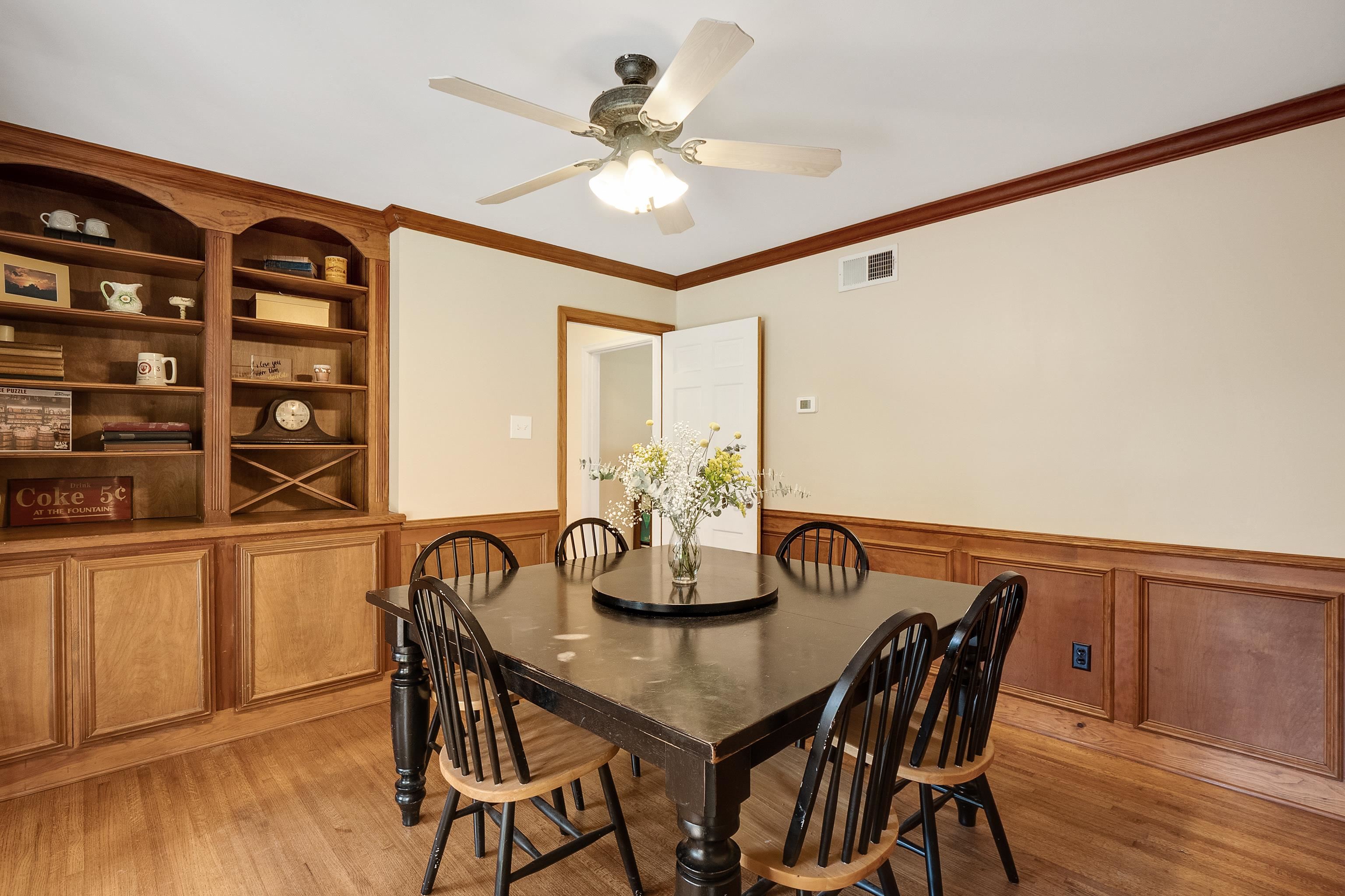5111 Sequoia Road Memphis, TN 38117 - Photo 12 of 25 a view of a dining room with furniture and wooden floor