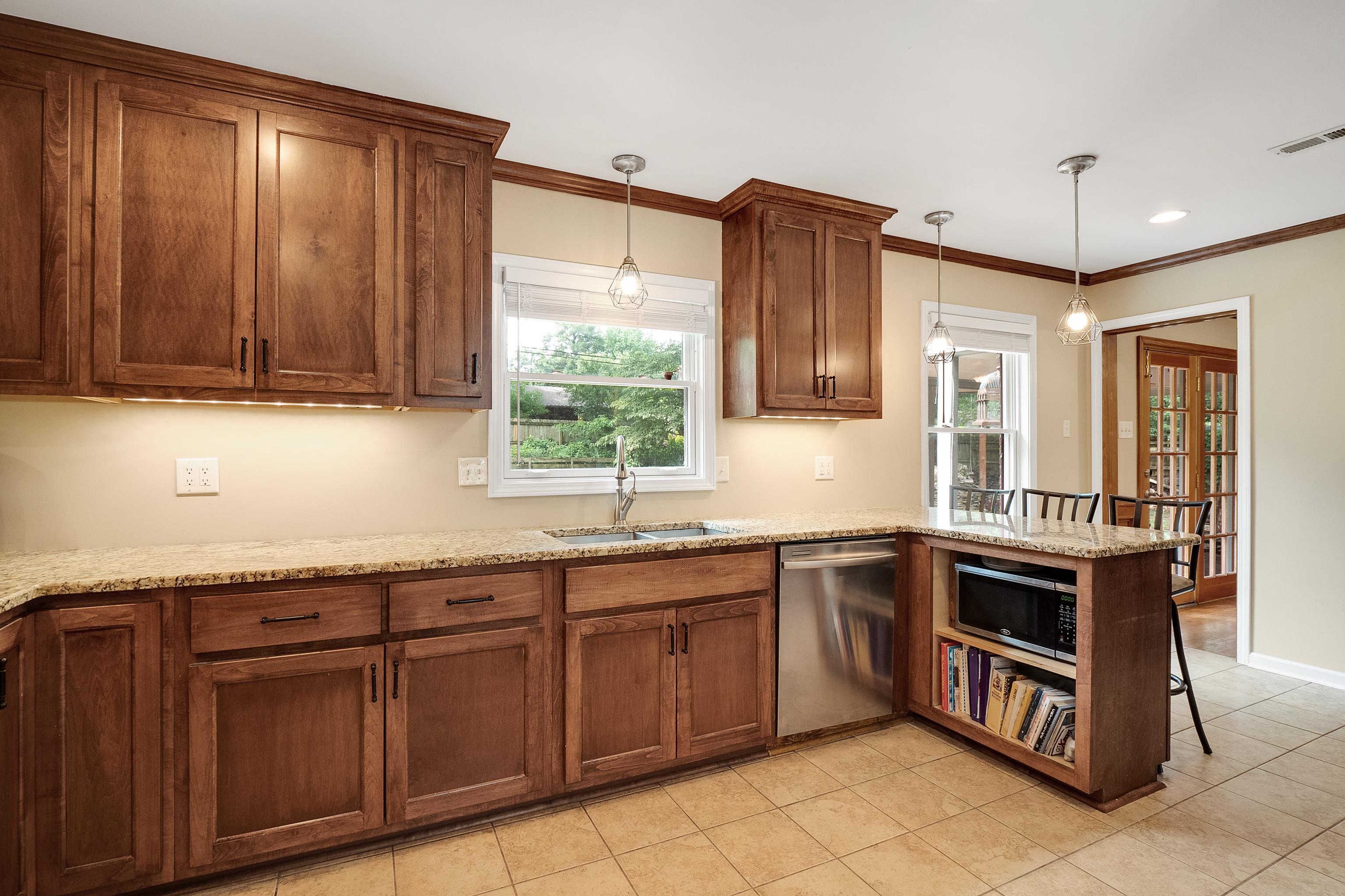 5111 Sequoia Road Memphis, TN 38117 - Photo 10 of 25 a kitchen with a sink and cabinets