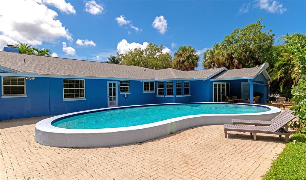 1389 Harbor Drive Sarasota, FL 34239 - Photo 15 of 25 a view of house with swimming pool outdoor seating and entertaining space
