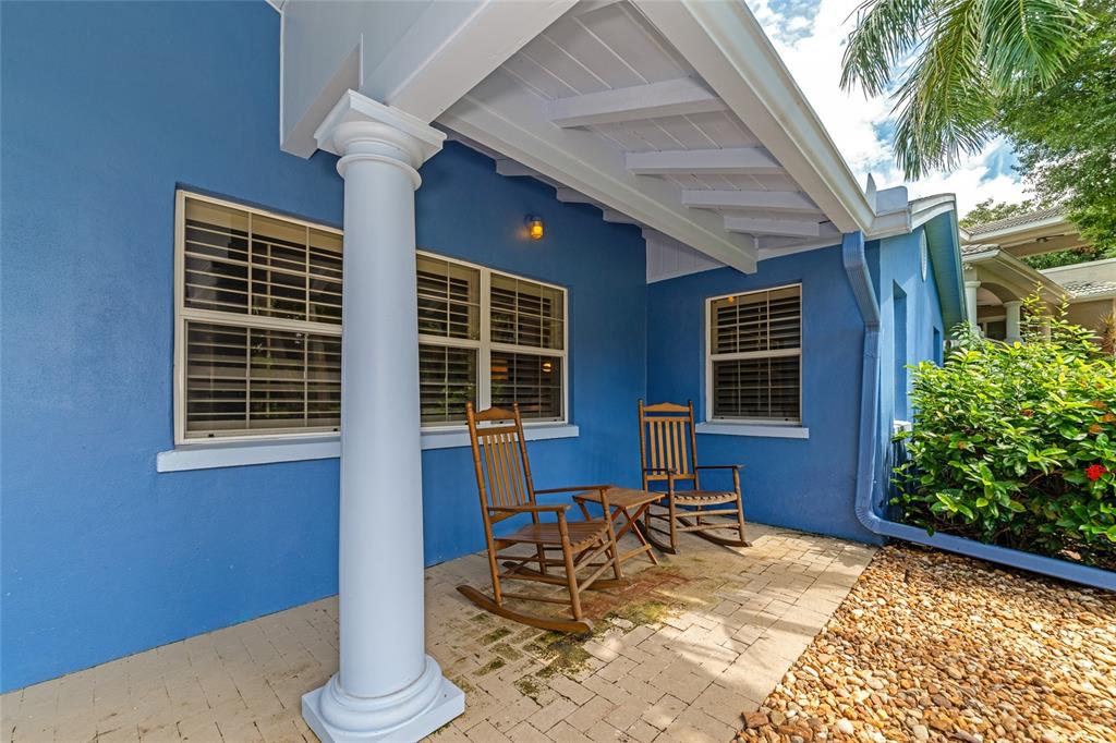 1389 Harbor Drive Sarasota, FL 34239 - Photo 17 of 25 a view of a lounge chairs in the porch