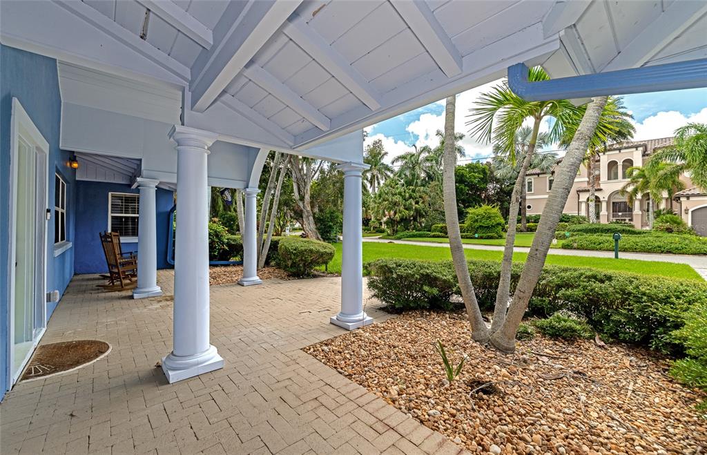 1389 Harbor Drive Sarasota, FL 34239 - Photo 18 of 25 a view of a porch with furniture and garden