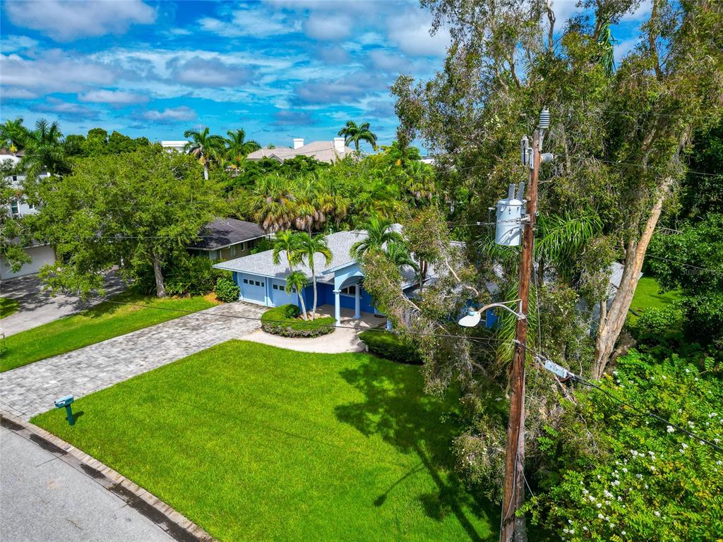 1389 Harbor Drive Sarasota, FL 34239 - Photo 5 of 25 a view of a house with a yard