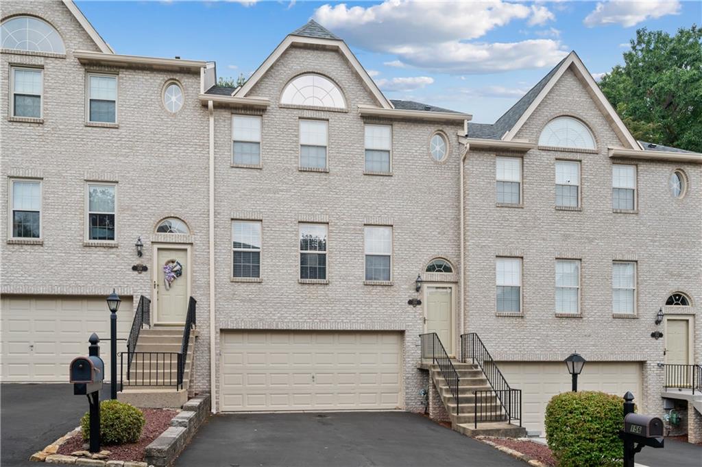 156 Terra Drive McKees Rocks, PA 15136 - Photo 1 of 27 Exterior is all brick with a 2 car garage
