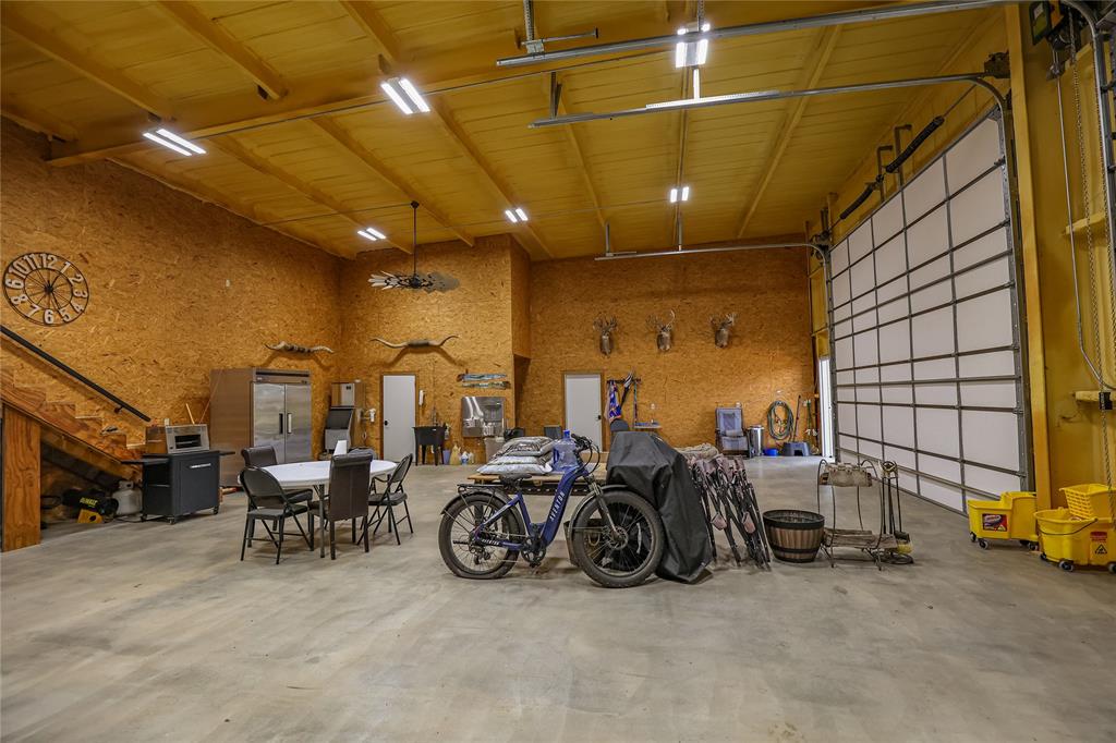 1250 County Road Brady, TX 76825 - Photo 32 of 40 a view of a garage with furniture