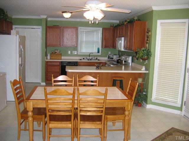 2033 Ruddy Road Raleigh, NC 27616 - Photo 2 of 9 Kitchen w/ Breakfast Nook, Bay Windows, Bar Style Counter Tops, Side by Side Frig., Built-In Microwave Other