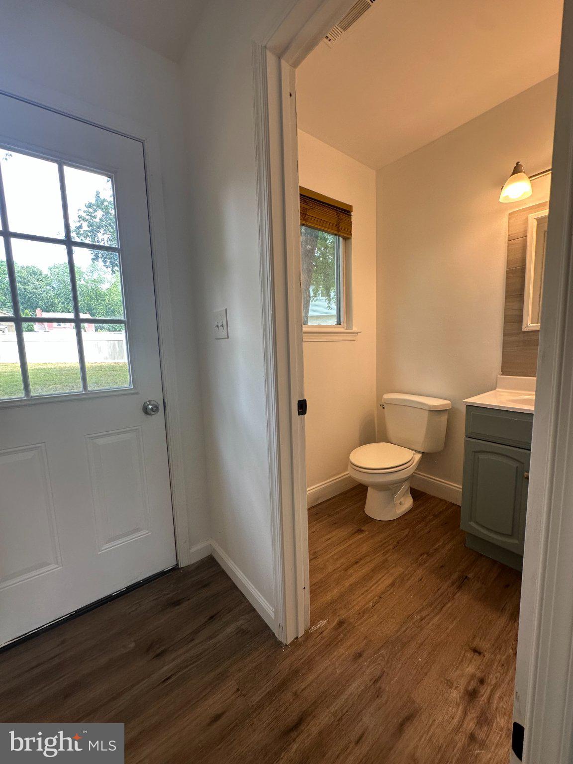 6 Travertine Way Newark, DE 19702 - Photo 9 of 22 a bathroom with a toilet sink and window