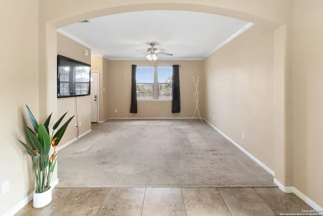 a view of livingroom with entryway and window