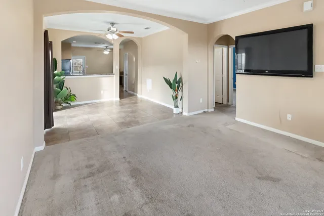a view of a living room with a flat screen tv