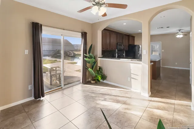 a view of a hallway with a chandelier