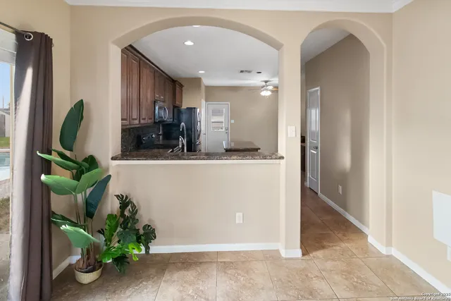 a view of living room with a potted plant