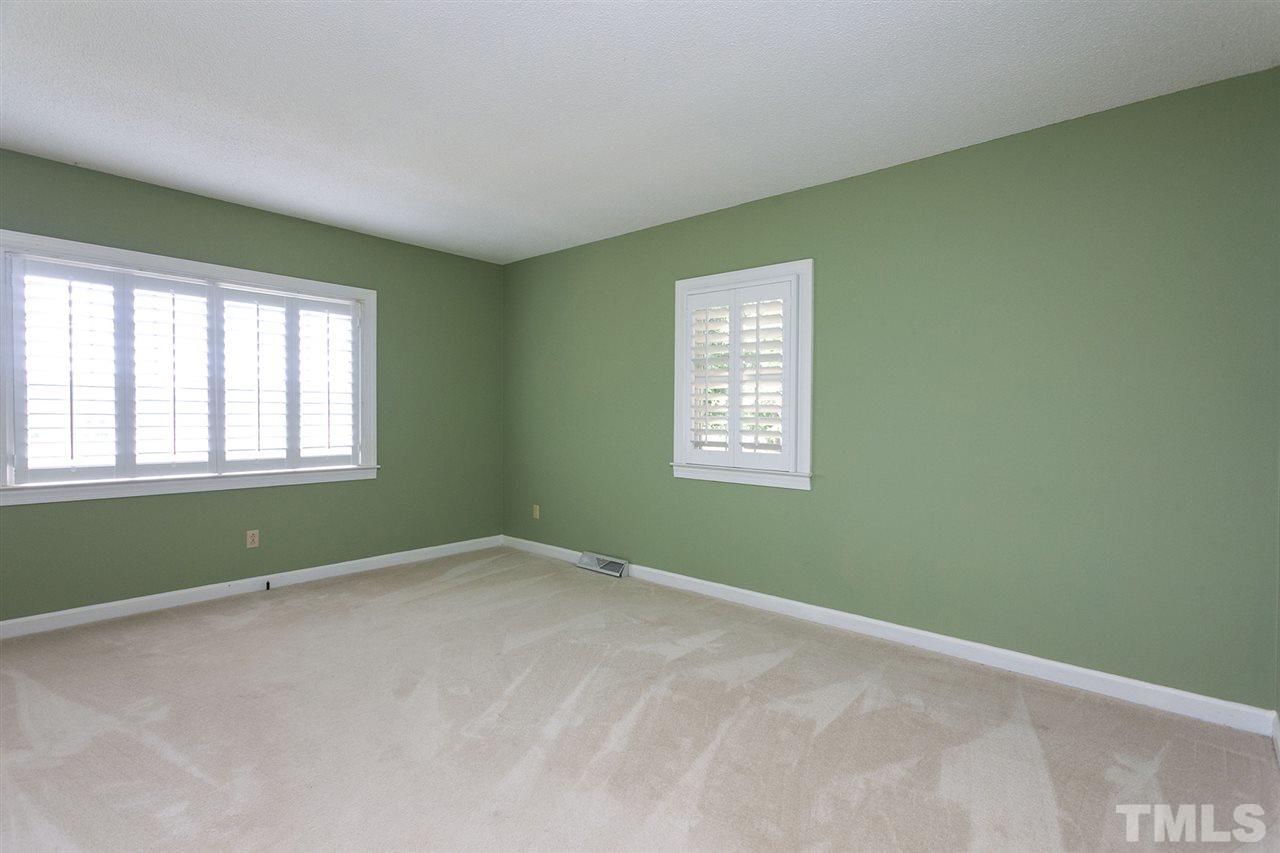 90 Johnson Town Road Zebulon, NC 27597 - Photo 12 of 18 an empty room with a window and closet