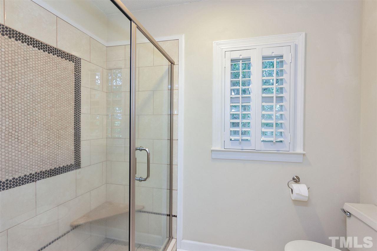 90 Johnson Town Road Zebulon, NC 27597 - Photo 14 of 18 a bathroom with a shower