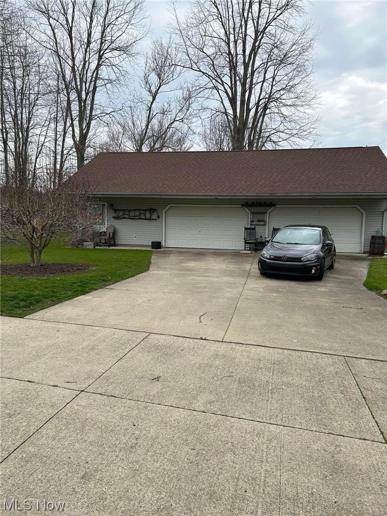 7500 Sanborn Road Ashtabula, OH 44004 - Photo 4 of 26 Detached 5 car garage, paved driveway