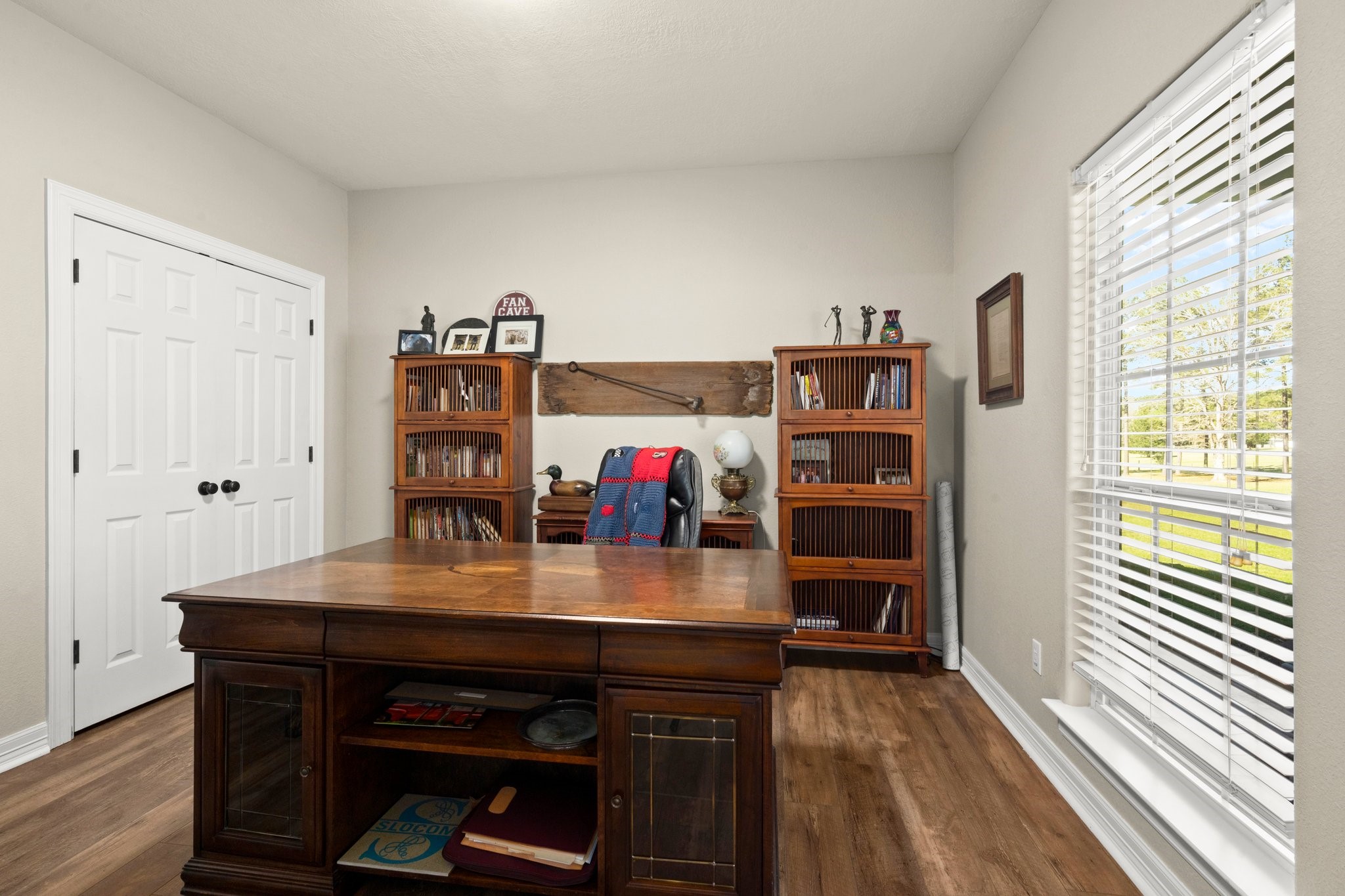 825 Walding Road Livingston, TX 77351 - Photo 14 of 50 a workspace with furniture and window