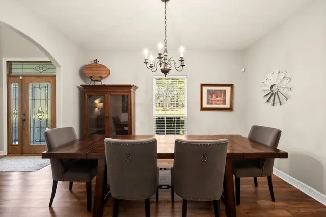 a kitchen with stainless steel appliances granite countertop a stove and a sink