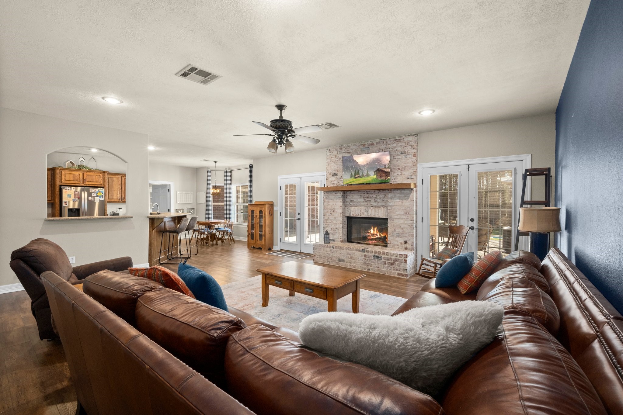 825 Walding Road Livingston, TX 77351 - Photo 23 of 50 a living room with furniture and a fireplace