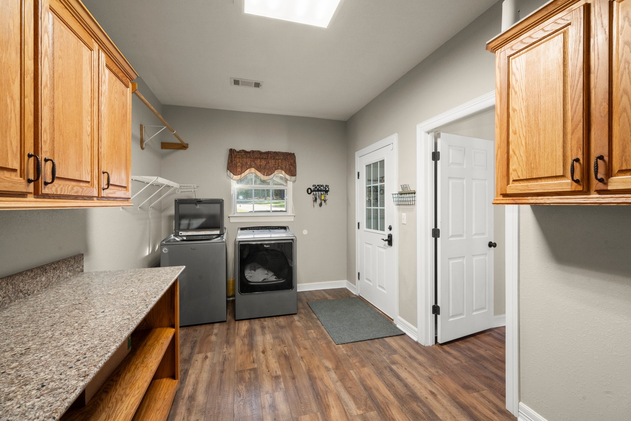 825 Walding Road Livingston, TX 77351 - Photo 29 of 50 a kitchen with a refrigerator and window