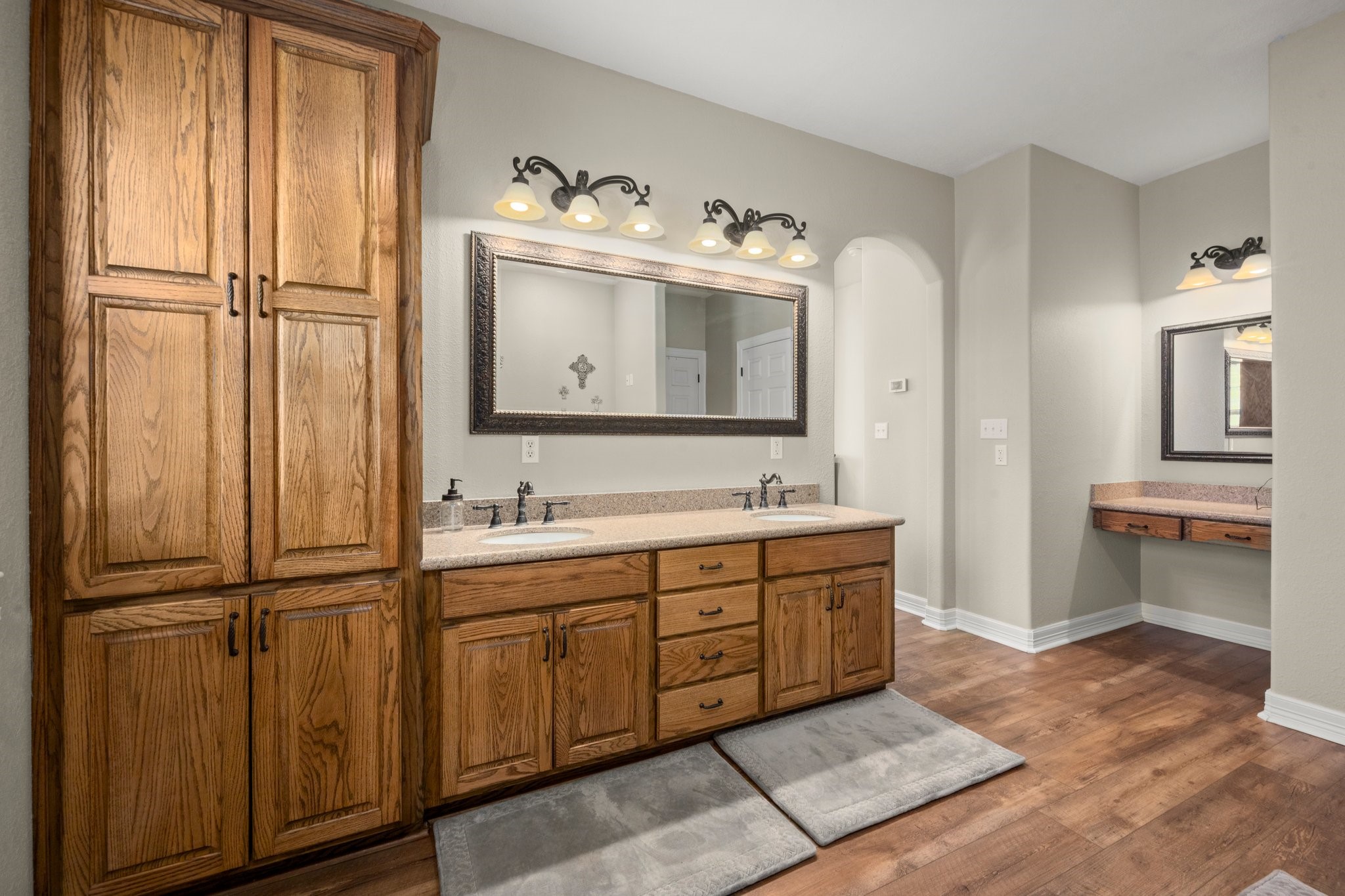 825 Walding Road Livingston, TX 77351 - Photo 38 of 50 a bathroom with a double vanity sink and mirror