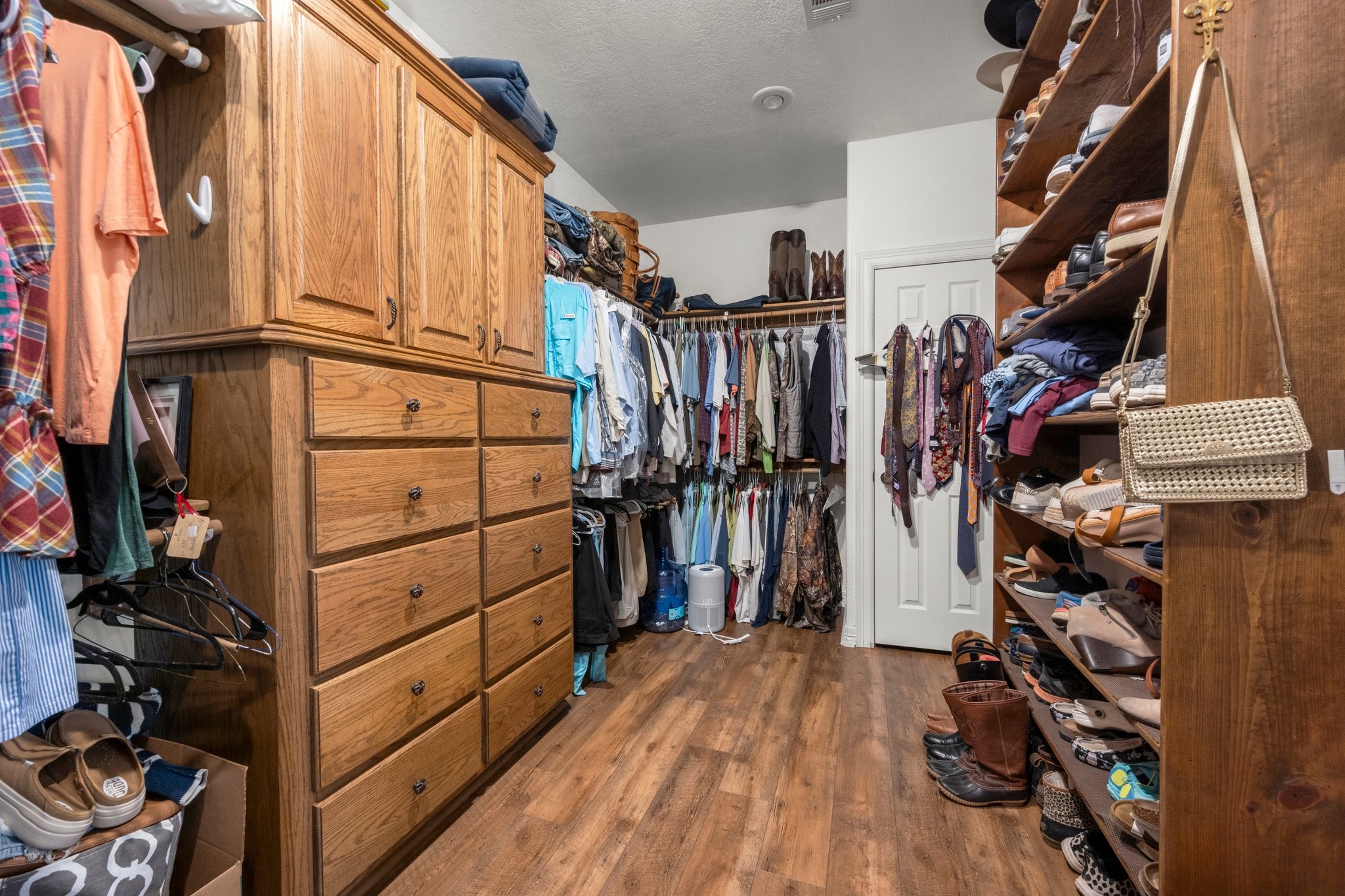 825 Walding Road Livingston, TX 77351 - Photo 39 of 50 a view of walk in closet with clothes