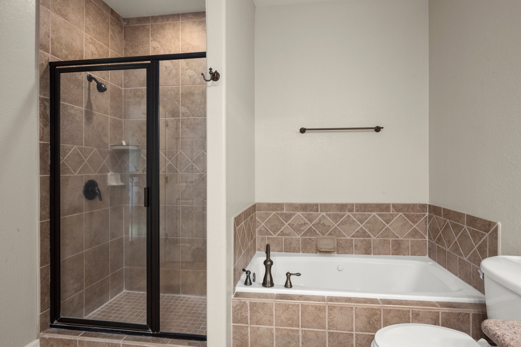 825 Walding Road Livingston, TX 77351 - Photo 47 of 50 a bathroom with a bathtub and shower