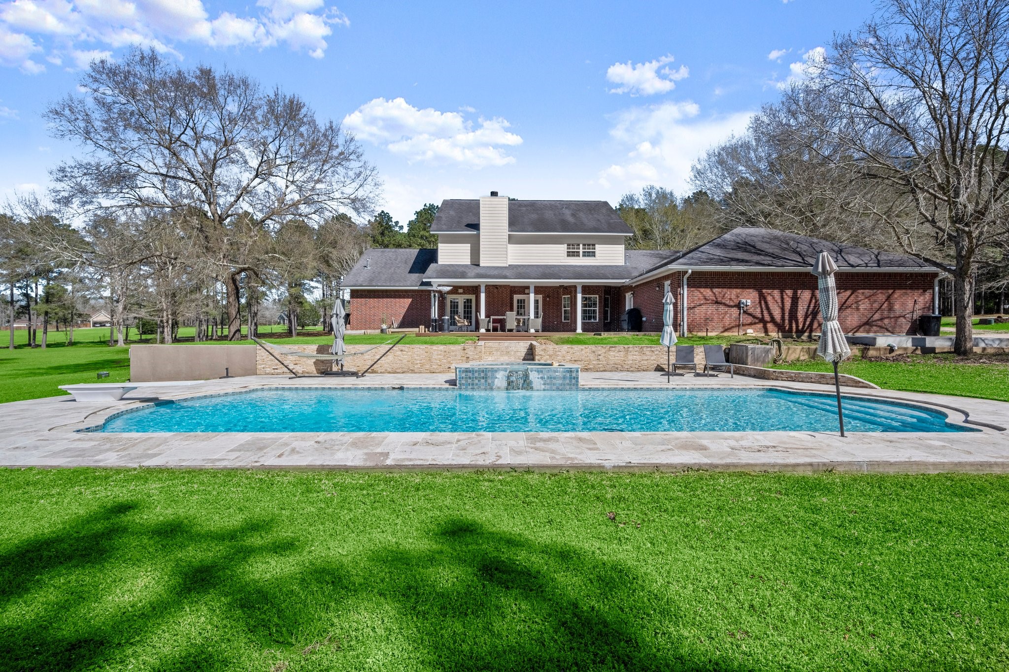 825 Walding Road Livingston, TX 77351 - Photo 5 of 50 a front view of building with yard and green space