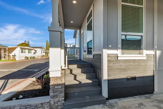 a view of balcony and wooden floor