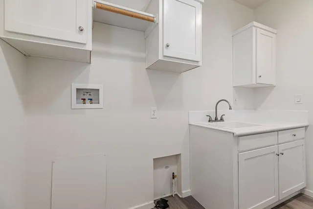 a close view of a sink and a vanity in the white house