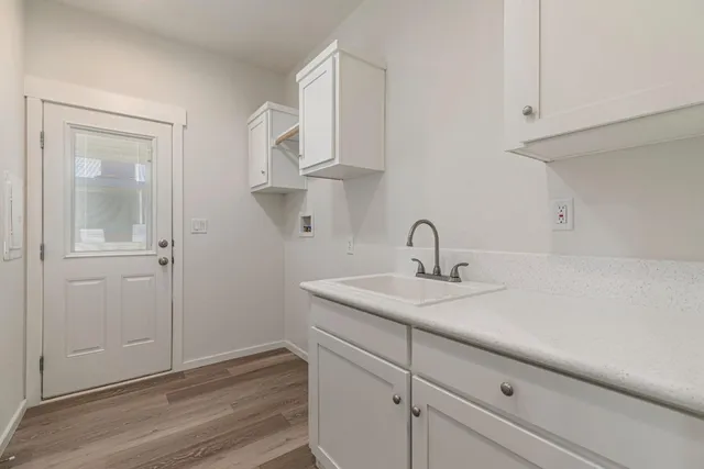 a view of a porch with wooden floor and stairs
