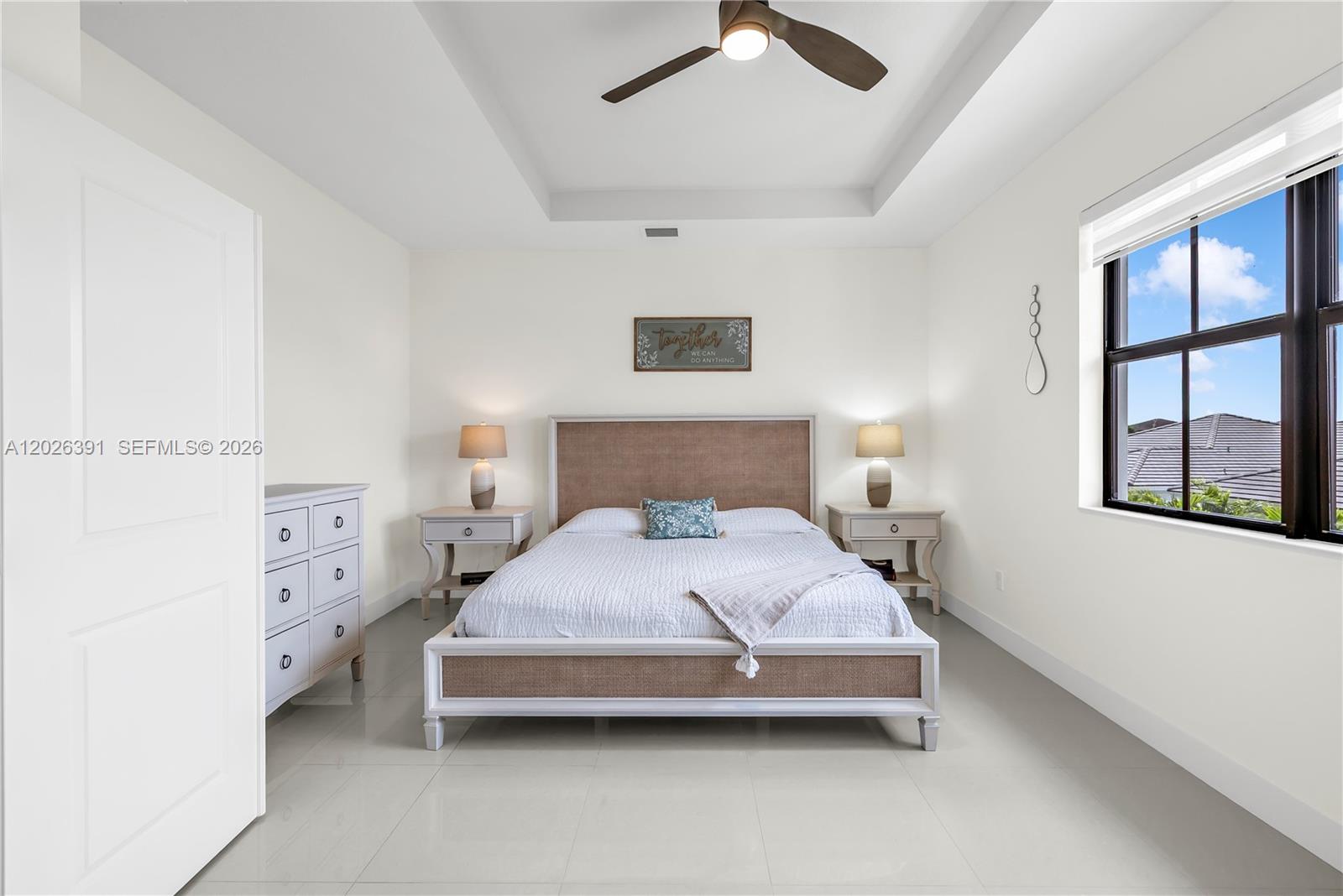 14606 Southwest 22nd Terrace Miami, FL 33175 - Photo 32 of 43 a bedroom with a bed and a window