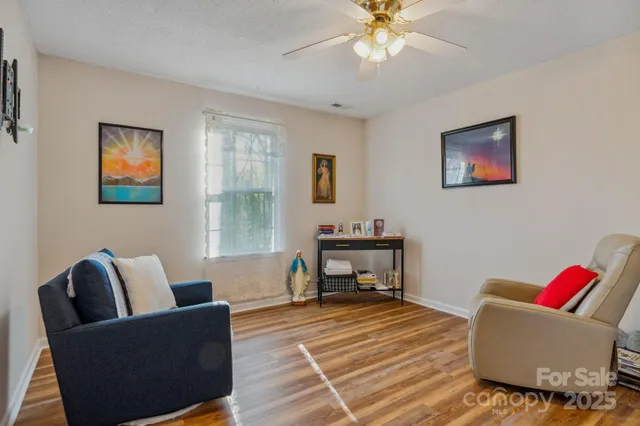 a view of room with lounge chair and couch