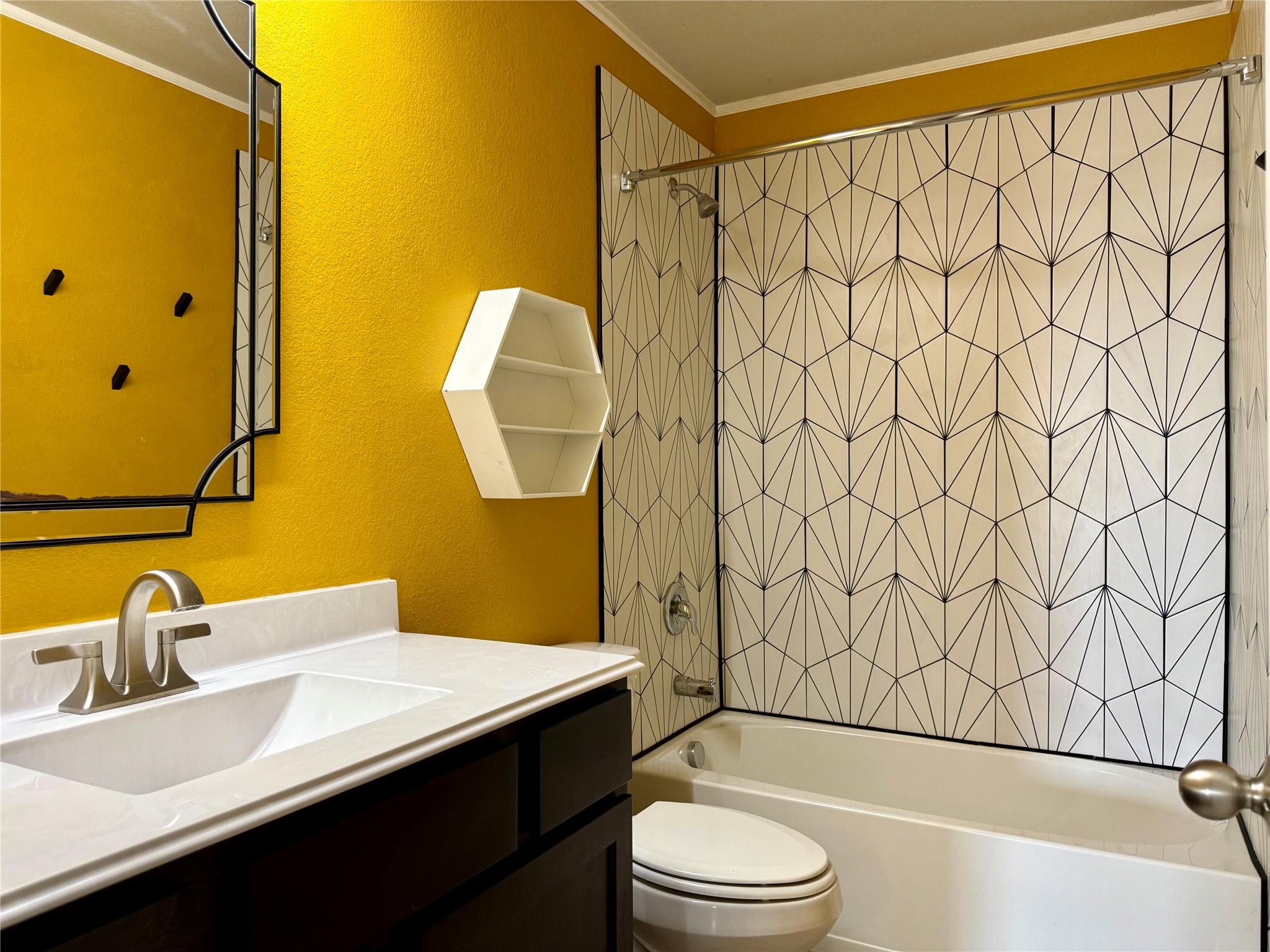 1293 Nevarez Kyle, TX 78640 - Photo 19 of 31 Full bath with bathing tub / shower combination, ornamental molding, vanity, and toilet!