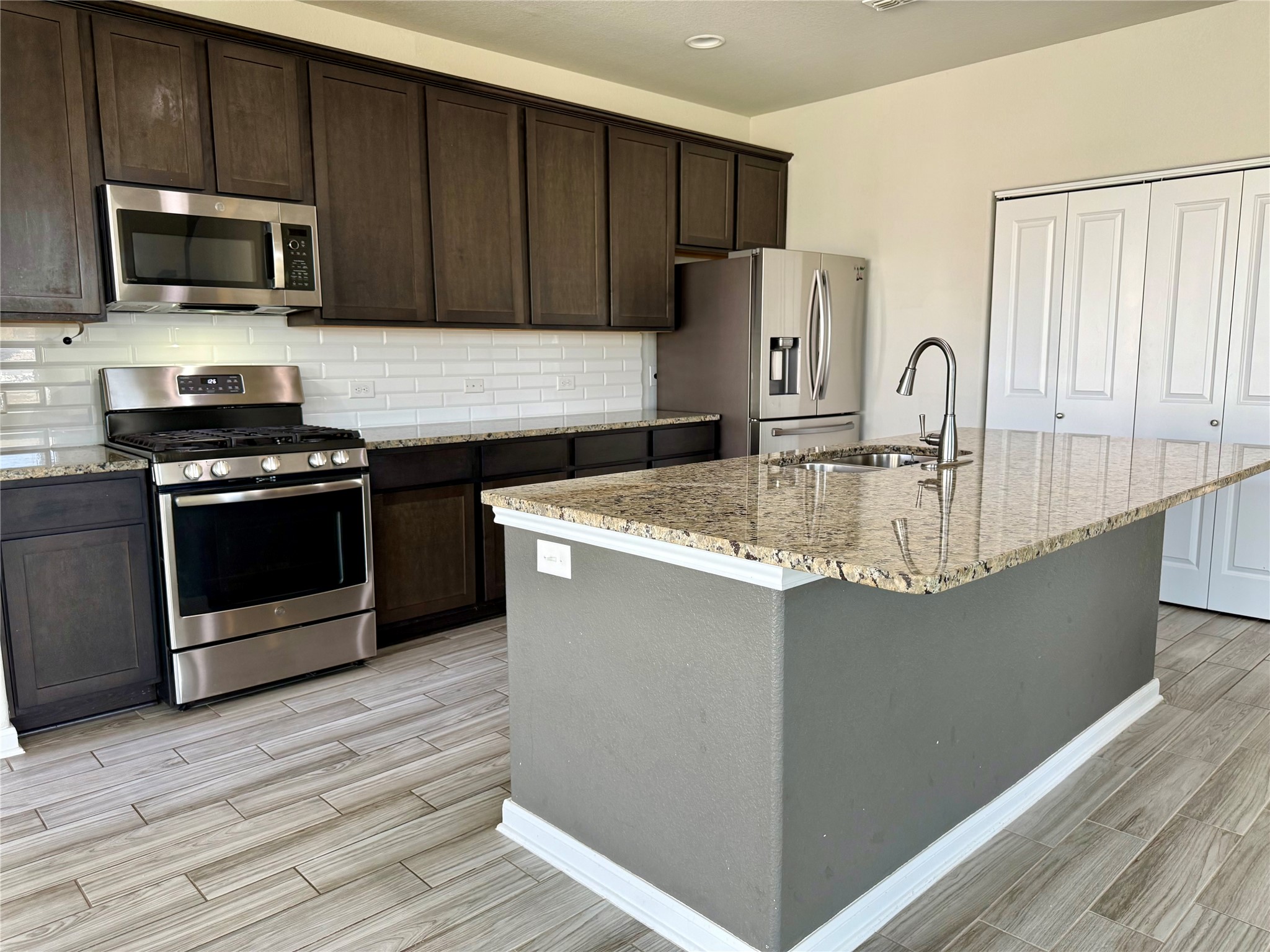 1293 Nevarez Kyle, TX 78640 - Photo 5 of 31 Spacious kitchen, more room for movement