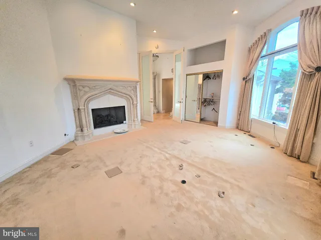 a view of a livingroom with a fireplace
