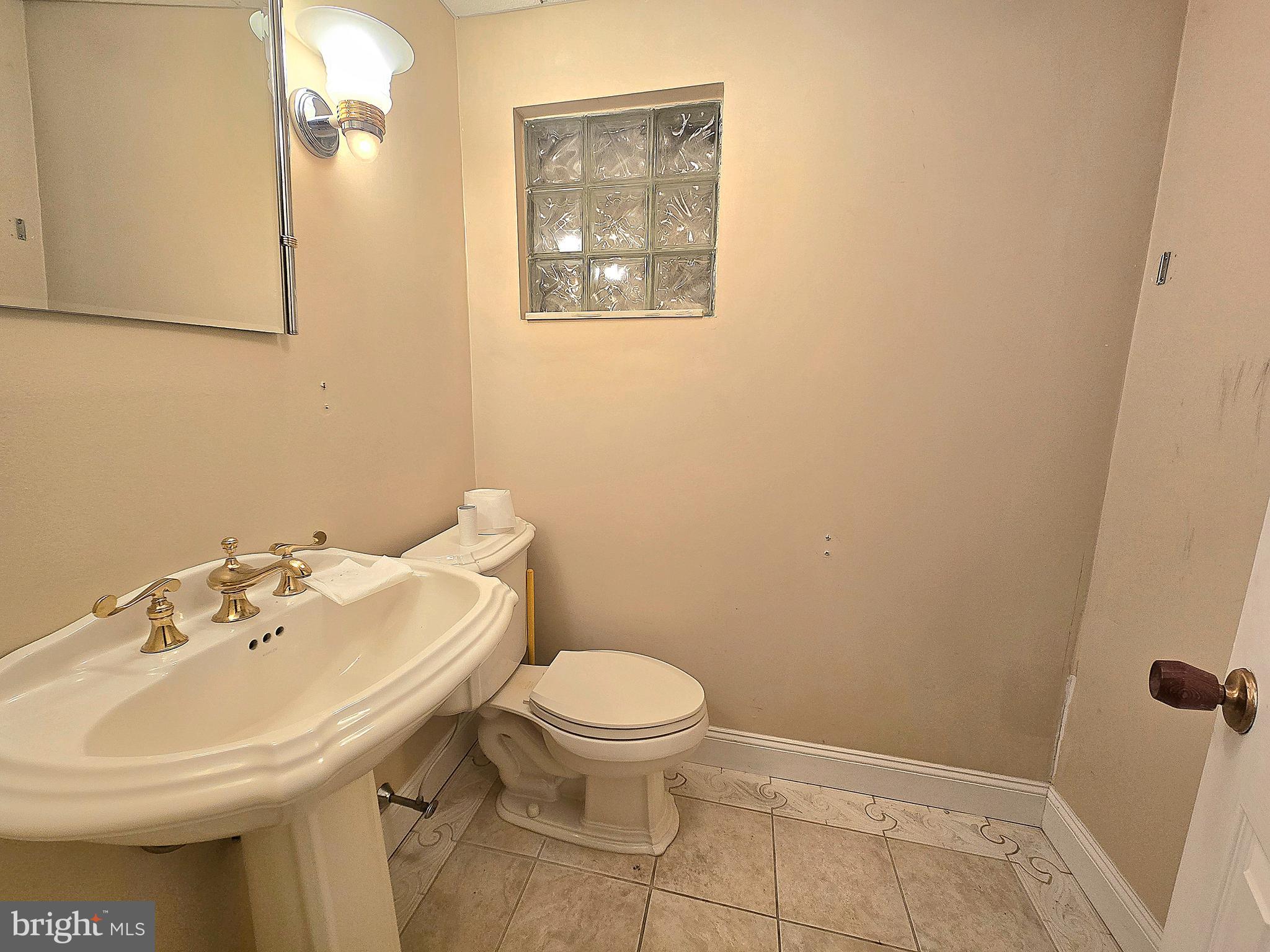 14 Carol Drive Clementon, NJ 08021 - Photo 13 of 26 a bathroom with a sink and a toilet