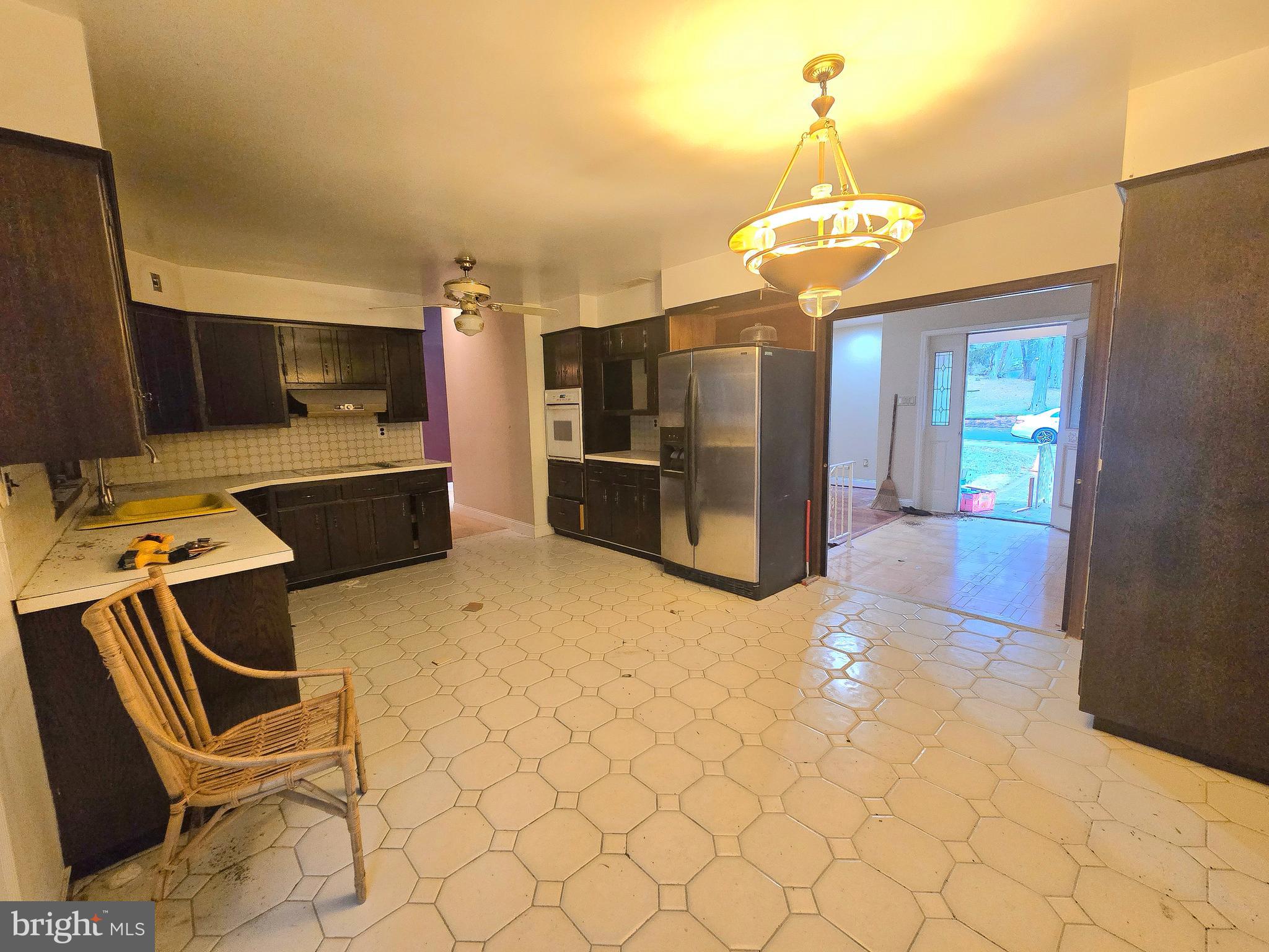 14 Carol Drive Clementon, NJ 08021 - Photo 17 of 26 a view of a kitchen with a sink and a refrigerator