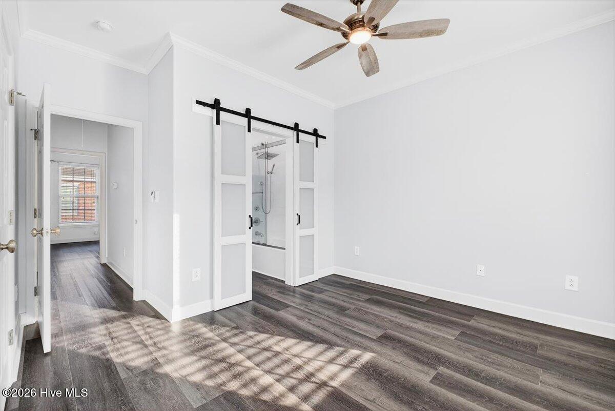 7640 Front Street, Unit 2 Sunset Beach, NC 28468 - Photo 26 of 46 Primary Bedroom