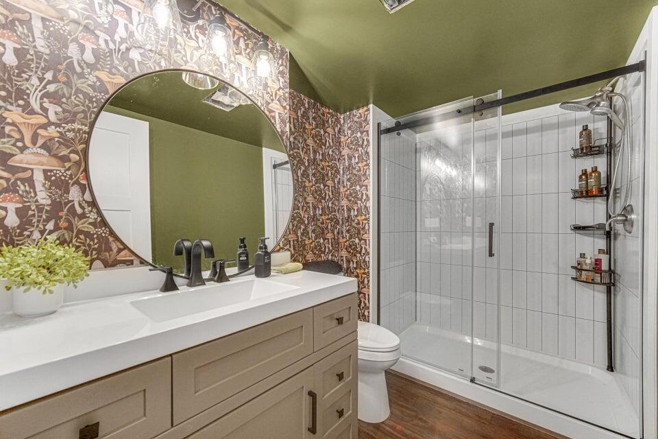 7960 East 173rd Avenue Hebron, IN 46341 - Photo 18 of 36 a bathroom with a sink a toilet and shower