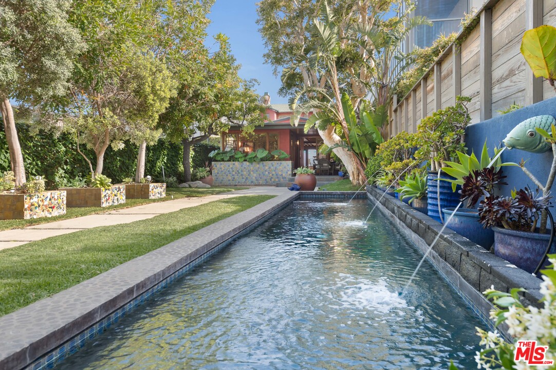 23746 Malibu Road Malibu, CA 90265 - Photo 27 of 46 a view of a backyard with a garden