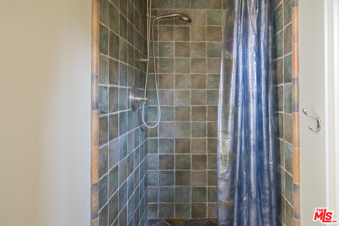 23746 Malibu Road Malibu, CA 90265 - Photo 33 of 46 a bathroom with a shower