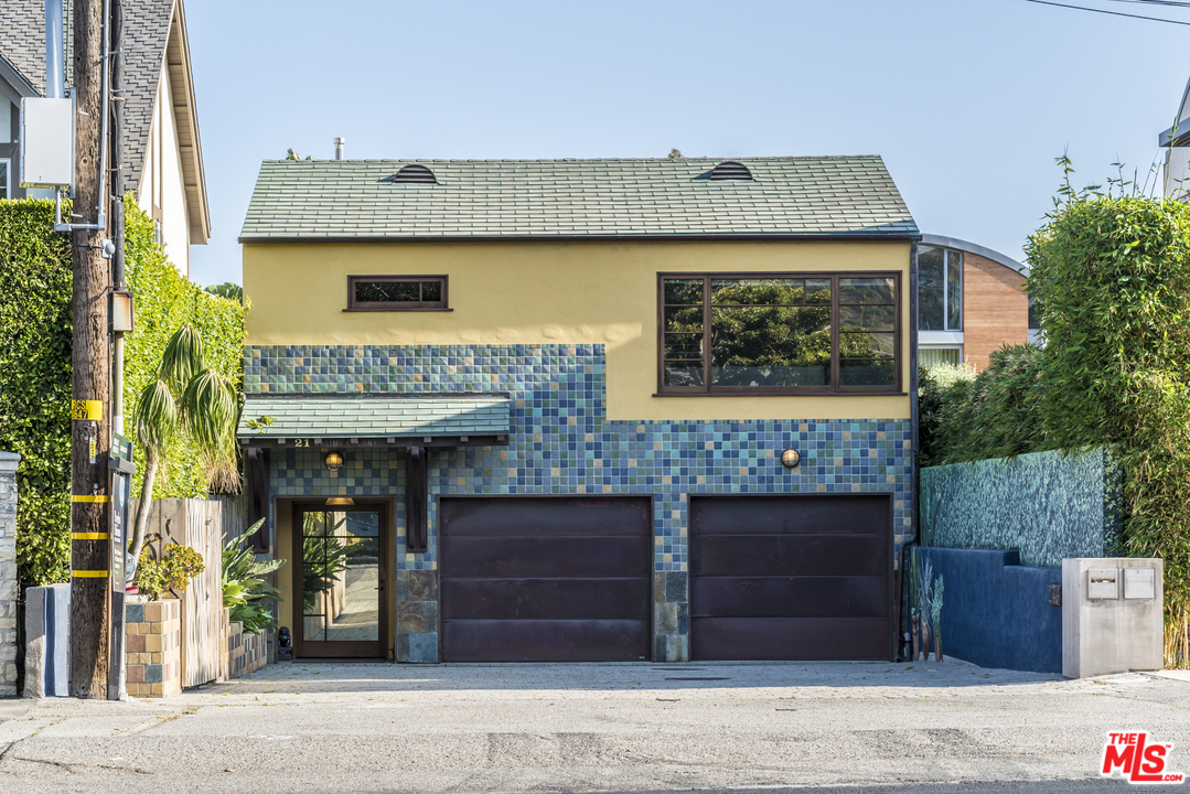 23746 Malibu Road Malibu, CA 90265 - Photo 42 of 46 a front view of a house with a garden