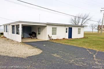 6024 Port Austin Road, Unit 2 Caseville, MI 48725 - Photo 3 of 13 6024PortAustinUnitBack.jpg
