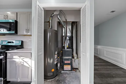 a view of an empty room and a window