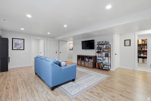 625 East 100 South Ephraim, UT 84627 - Photo 16 of 26 Spacious room featuring wood-finish flooring, recessed lighting, and crisp white trim