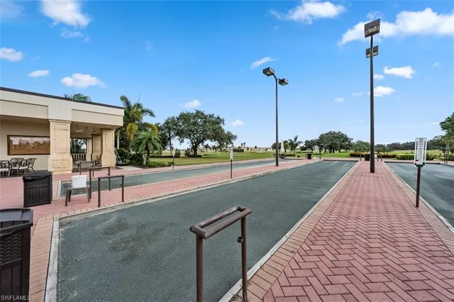 a view of a table and chairs in the garden