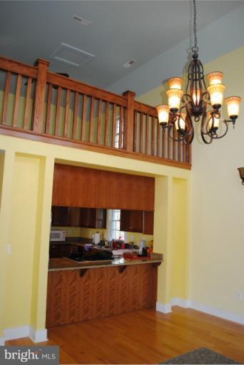 77 Forest Grove Road Amissville, VA 20106 - Photo 23 of 30 a kitchen with stainless steel appliances granite countertop a sink and a refrigerator