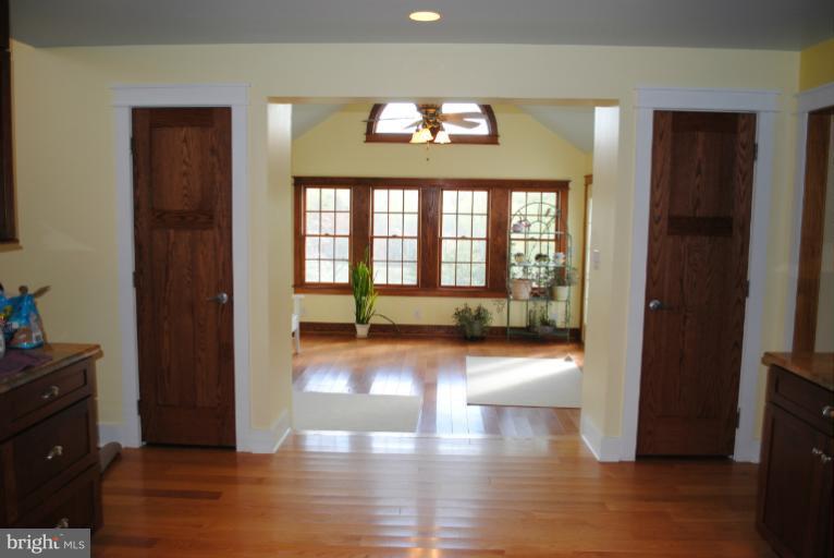 77 Forest Grove Road Amissville, VA 20106 - Photo 8 of 30 an empty room with wooden floor and windows